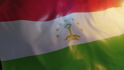 Realistic Waving Flag of Tajikistan with Sunlight