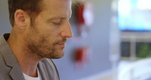 Businessman using laptop in office 4k