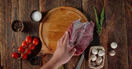 Raw Beef Placed on Rustic Wooden Cutting Board