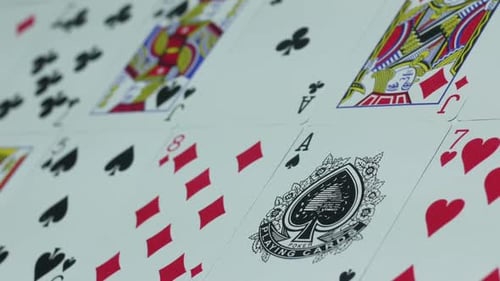 Assorted Playing Cards Arranged in Rows