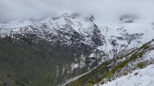 Snowy Mountain Range Aerial View on Overcast Day