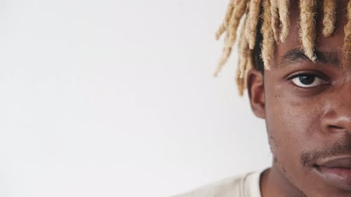 Young Adult Portrait with Blonde Dreadlocks