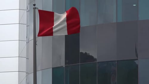 Peru National Flag Waving by Modern Building