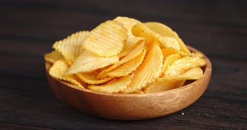 Wooden Bowl with Delicious Potato Chips
