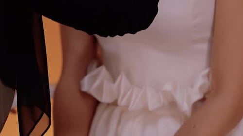 Applying Eye Shadow Makeup to Model