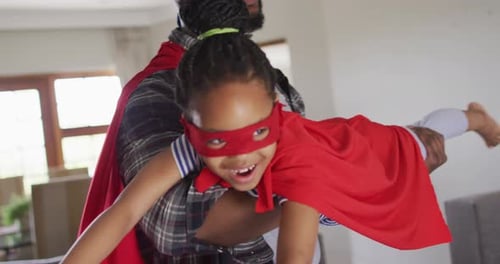 Father Pretends Daughter is Flying Like Superhero