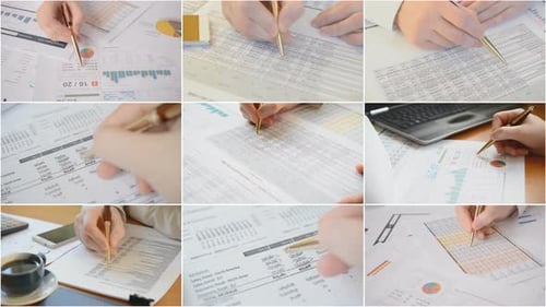 Hands Reviewing Financials in an Office Montage