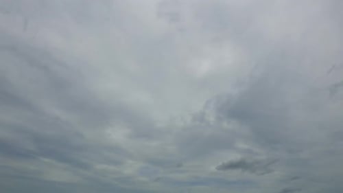 Time lapse of white cloud moving pass around sky background
