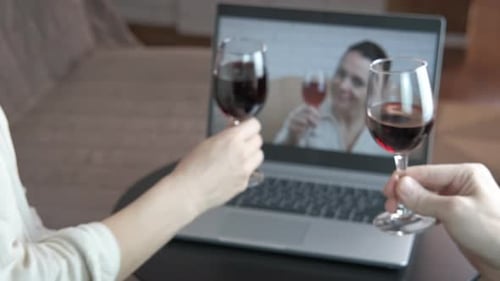 Virtual Toast Over Video Call with Red Wine