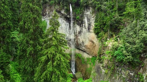 Beautiful Summer Waterfall in the Forest Magical Morning Nature Landscape in Sunny Weather Aerial