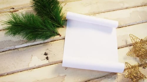 Christmas Decoration with Blank Paper Scroll on Wood
