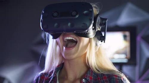 Woman Using Virtual Reality Headset in Modern Setting