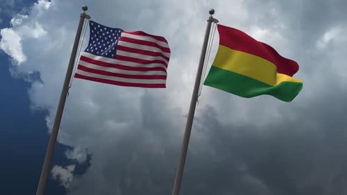 United States and Tricolor National Flags Waving in Wind