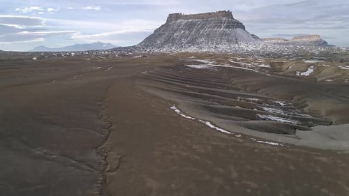 Flying fast over vast desert landscape view erosion