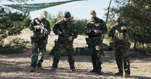 Four Men Stand Guard Soldiers Dressed in Moro Uniforms Army in Readiness to Defend the Territory