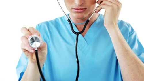 Close-up of male surgeon checking with stethoscope