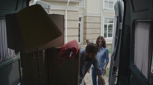 Young Family Moving in New Place