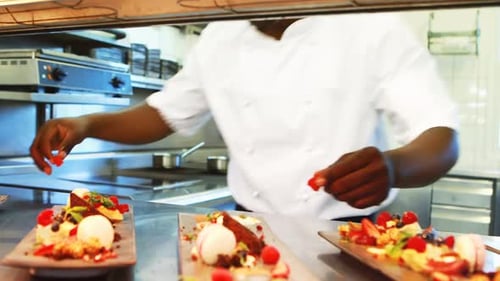 Chef preparing dessert at order station