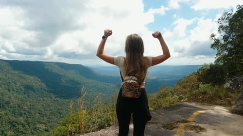 Inspired Travel Woman with Backpack Raised Her Hands Up Standing Top of Mountain