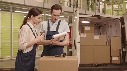 Courier and Manager Working in Storage