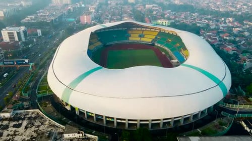 Aerial View - The largest stadium looks from drone. With smog pollution