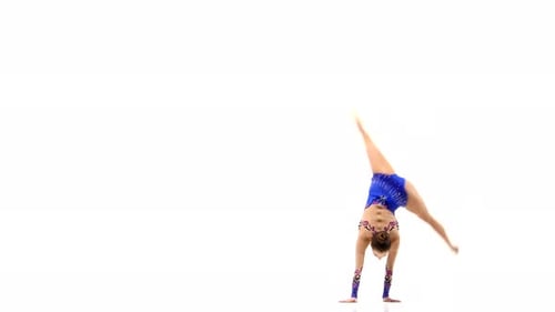 Teen Gymnast Performs Handstand Routine in Studio