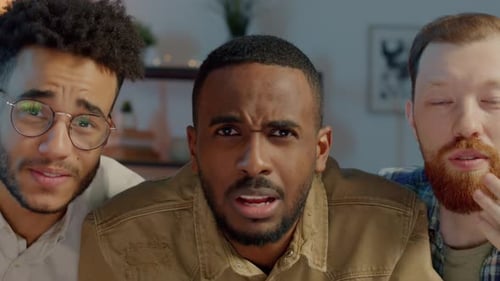 Three Friends Reacting to Something, Laughing Together