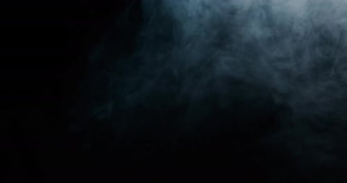 Ethereal White Smoke Swirling Against Black Background