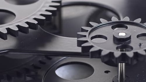 Rotating Gears Close-Up of Black Mechanical Mechanism
