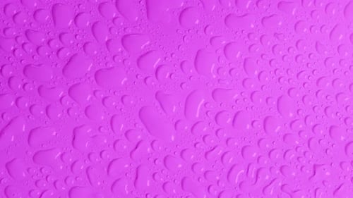 Rotating Bright Purple Background with Water Drops Top View