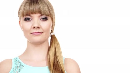 Blonde Woman Smiling and Looking at Camera