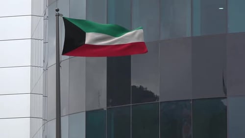 Realistic 3D Kuwait Flag Waving on Modern Building Flagpole
