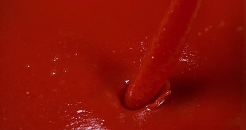 Tomatoe's Juice being poured, Slow Motion 4K