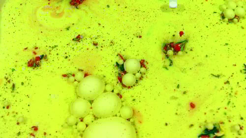 Abstract Yellow Liquid with Floating Bubbles