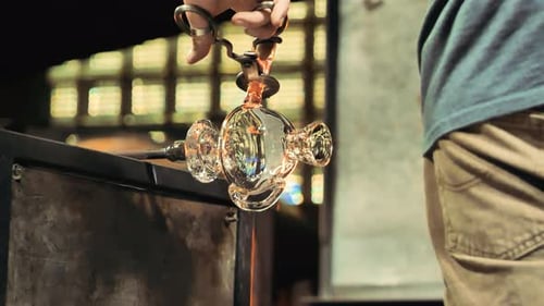Glass Blower Creates Art with Molten Glass