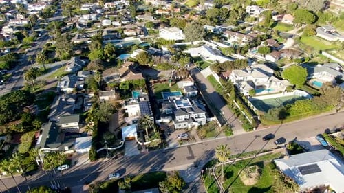 Aerial View of La Jolla Little Coastline City with Wealthy Villas and Swimming Pool.