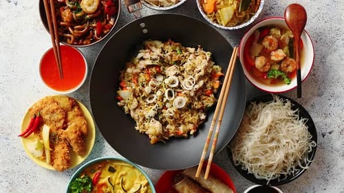 Asian Oriental Food Composition in Colorful Dishware