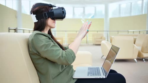Side View Woman Enjoying Modern Vr Technology Using 3D Virtual Reality Headset and Laptop