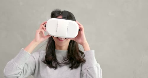 Woman Experiencing Virtual Reality Headset
