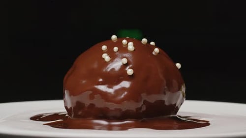 Chocolate Dessert Ball with Sprinkles on Plate