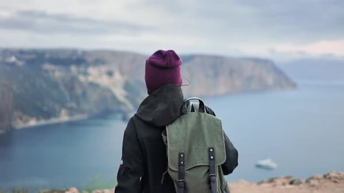 Active Backpacker Woman Running Jumping on Mountain Peak Celebrating Winner Victory Success