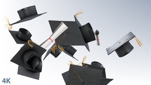 Graduation Caps Flying in Slow Motion