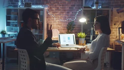 Happy Colleagues Smartphone App Developers Discussing Work in Dark Office