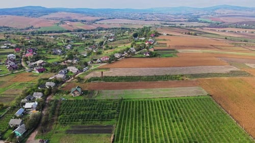 Flight over the houses in the Ukrainian village Aerial view.