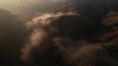4K Drone Flying through the clouds at dusk or dawn. Aerial top cloudscape