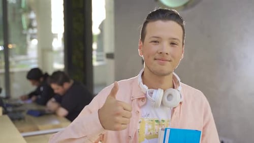 Young people studying in the library.