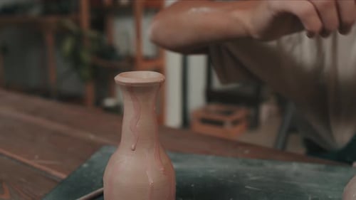 Ceramic Vase Being Glazed with Slip