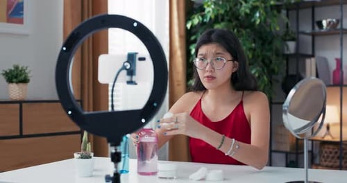 A Beauty Influencer Records a Vlog on Social Media About Her Skincare Routine