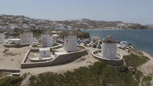 Aerial view of traditional windmill near the coast, Greece.