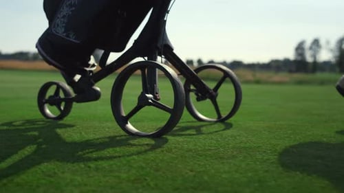 Golf Cart Rolling on Green Golf Course